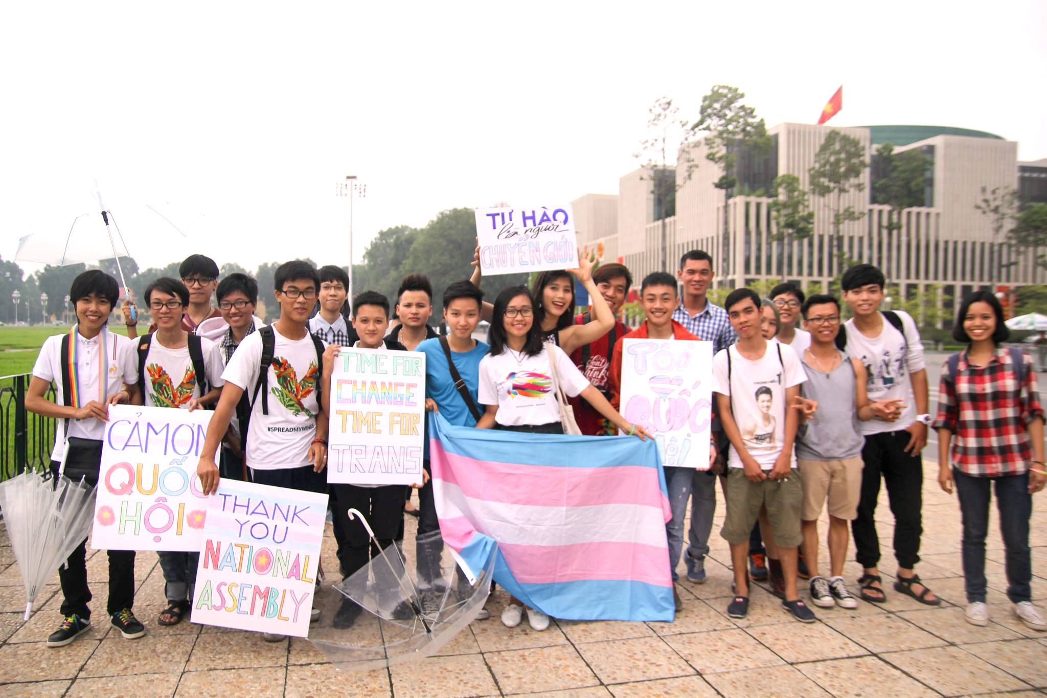 Many LGBT activists flock to the streets in Hanoi to applaud the new legislation. They raise flags and boards, some of which read “Cam on Quoc hoi” (Thank you, National Assembly). .jpg