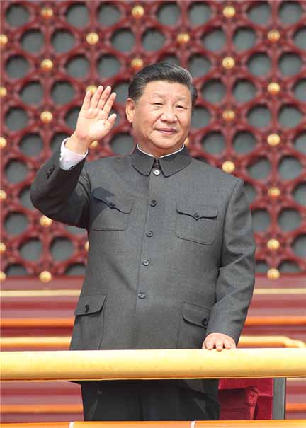 Xi Jinping waving thumb.jpg