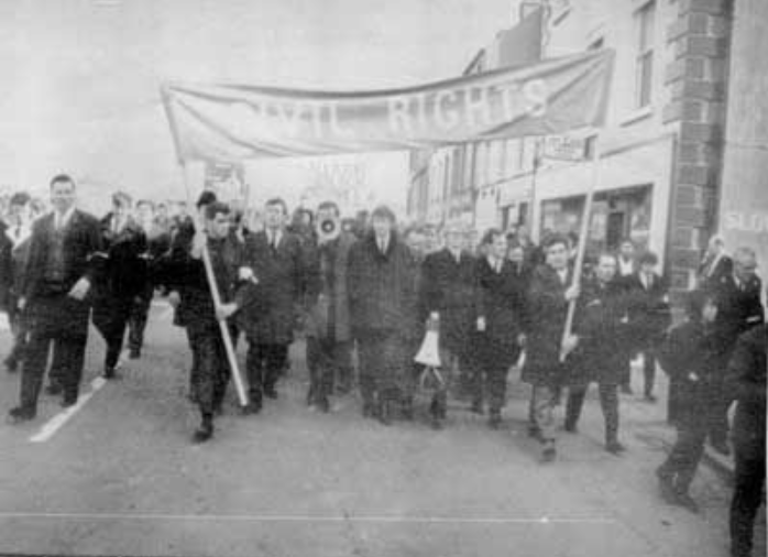 Thumbnail for File:Civil Rights march in Enniskilled with Bernard O'Connor 1969 from "We Shall Overcome".png