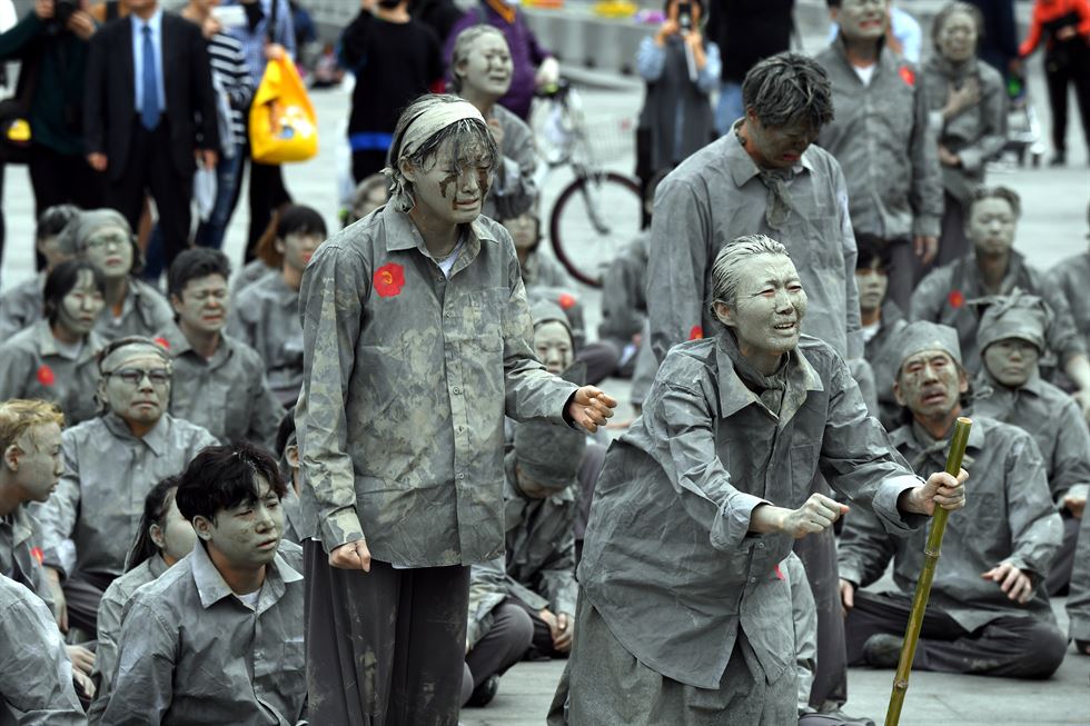 Actors re-enact the massacre of residents branded as communist insurgents during the Jeju Uprising and Massacre, for its 70th anniversary.jpg