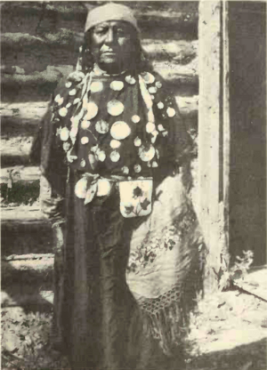 Osh-Tish standing and looking at camera for portrait